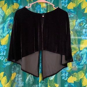 Woman’s black velvet shoulder shrug